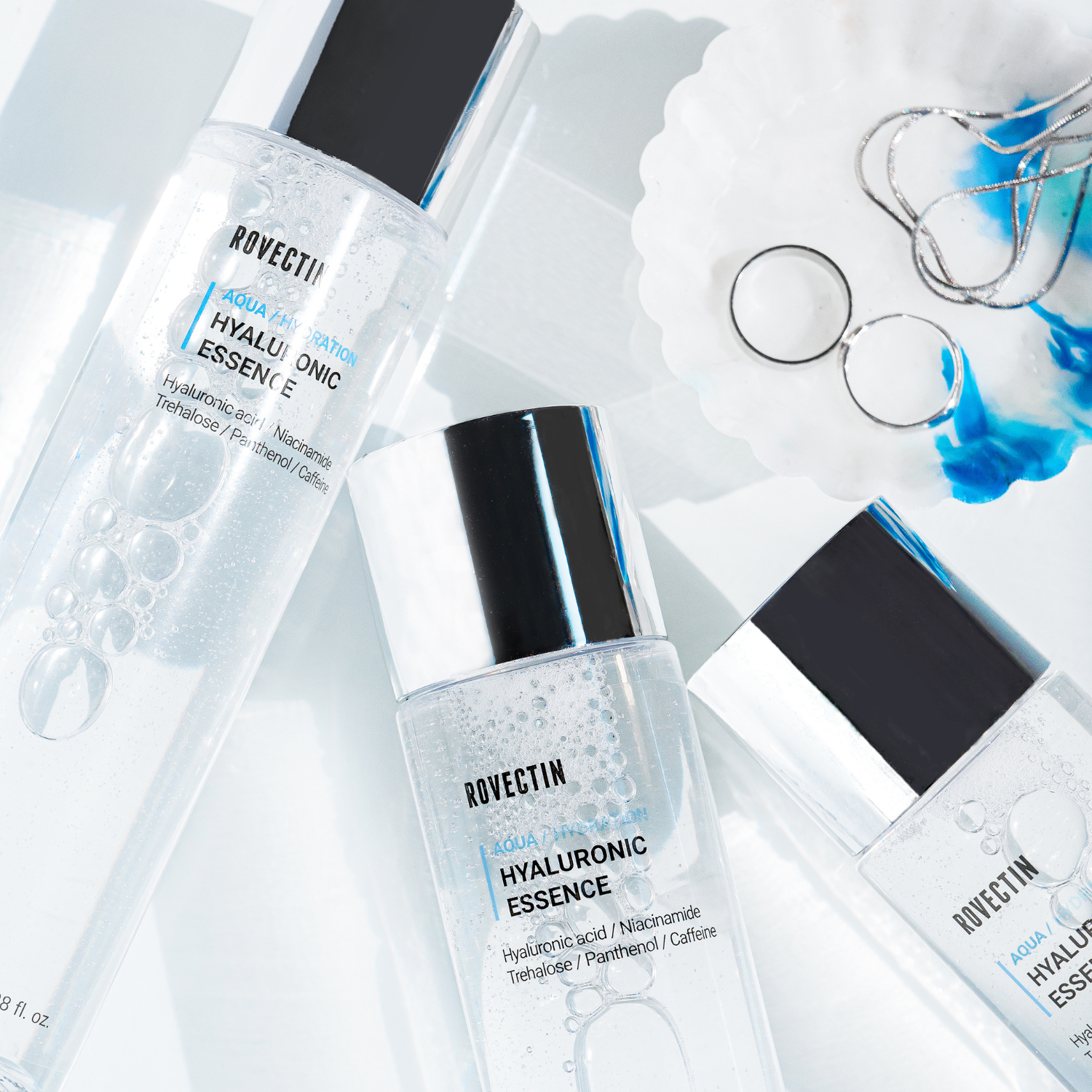 Rovectin Hyaluronic Essence bottle with clear label, 180ml, featuring a pump dispenser and transparent packaging.