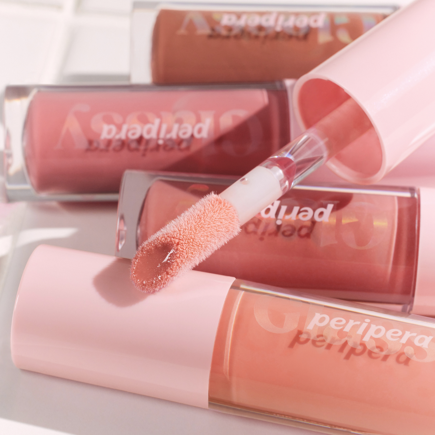 Peripera Ink Glasting Lip Gloss (18 Colours) - Shop now at Glowii Beauty