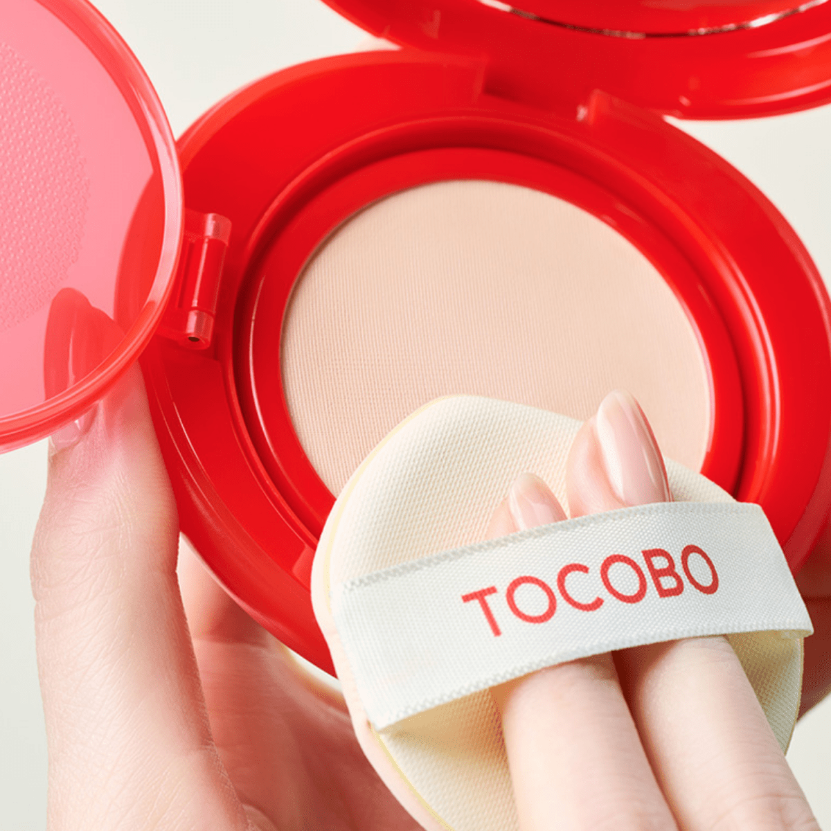 TOCOBO Apple Dewy Fit Cushion Foundation in 15g with a compact, natural finish, featuring a soft, dewy makeup look.