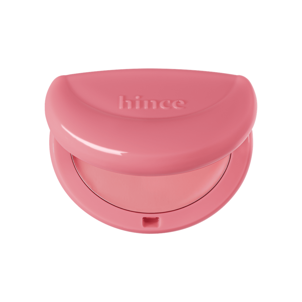 Hince Half-Moon Cheek Cream to Powder Blush in a compact with a half-moon shape, showcasing its creamy texture and blush shade.