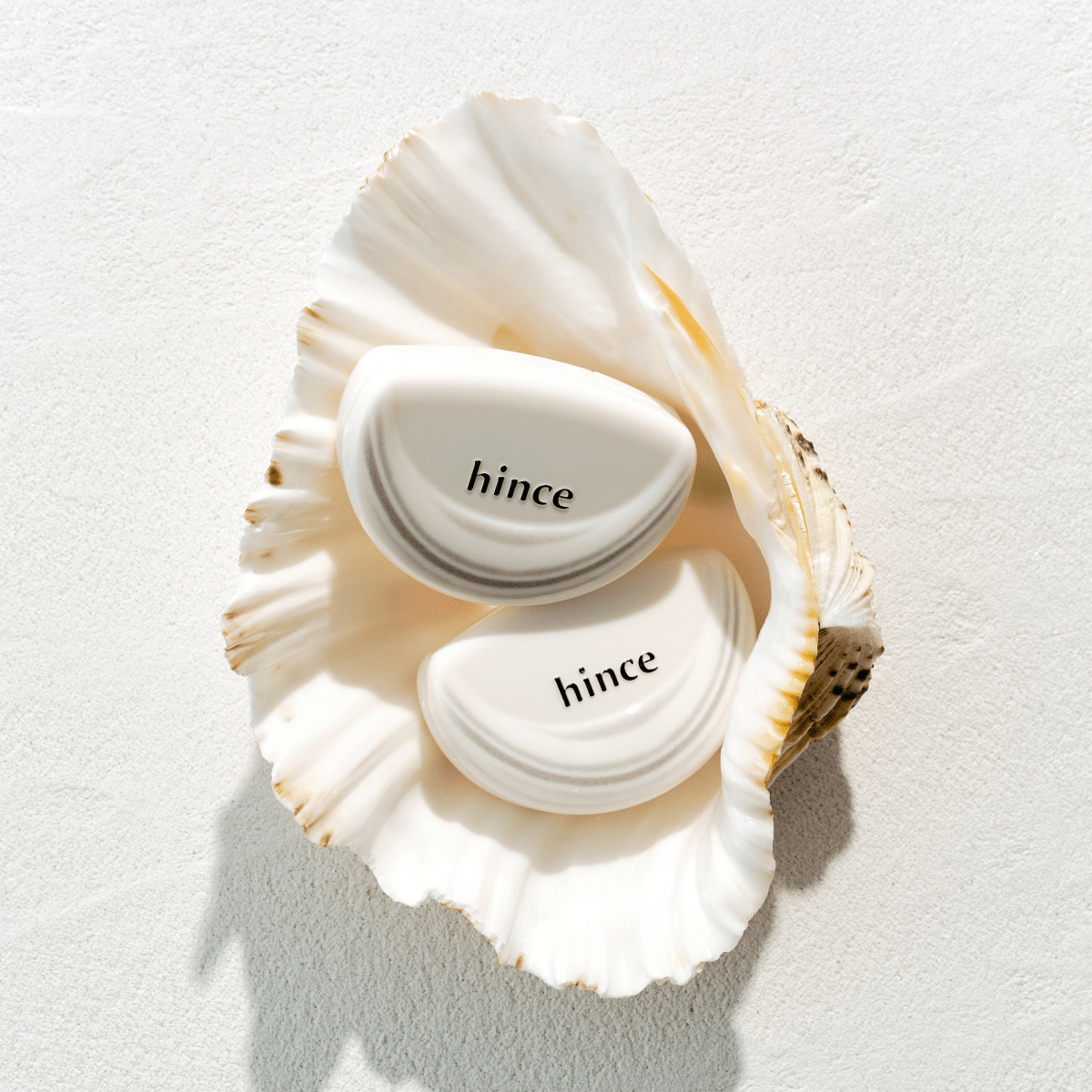 Hince Half-Moon Cheek Cream-to-Powder blush in Chill Voyage edition, showing the compact with blush inside and soft pastel packaging.