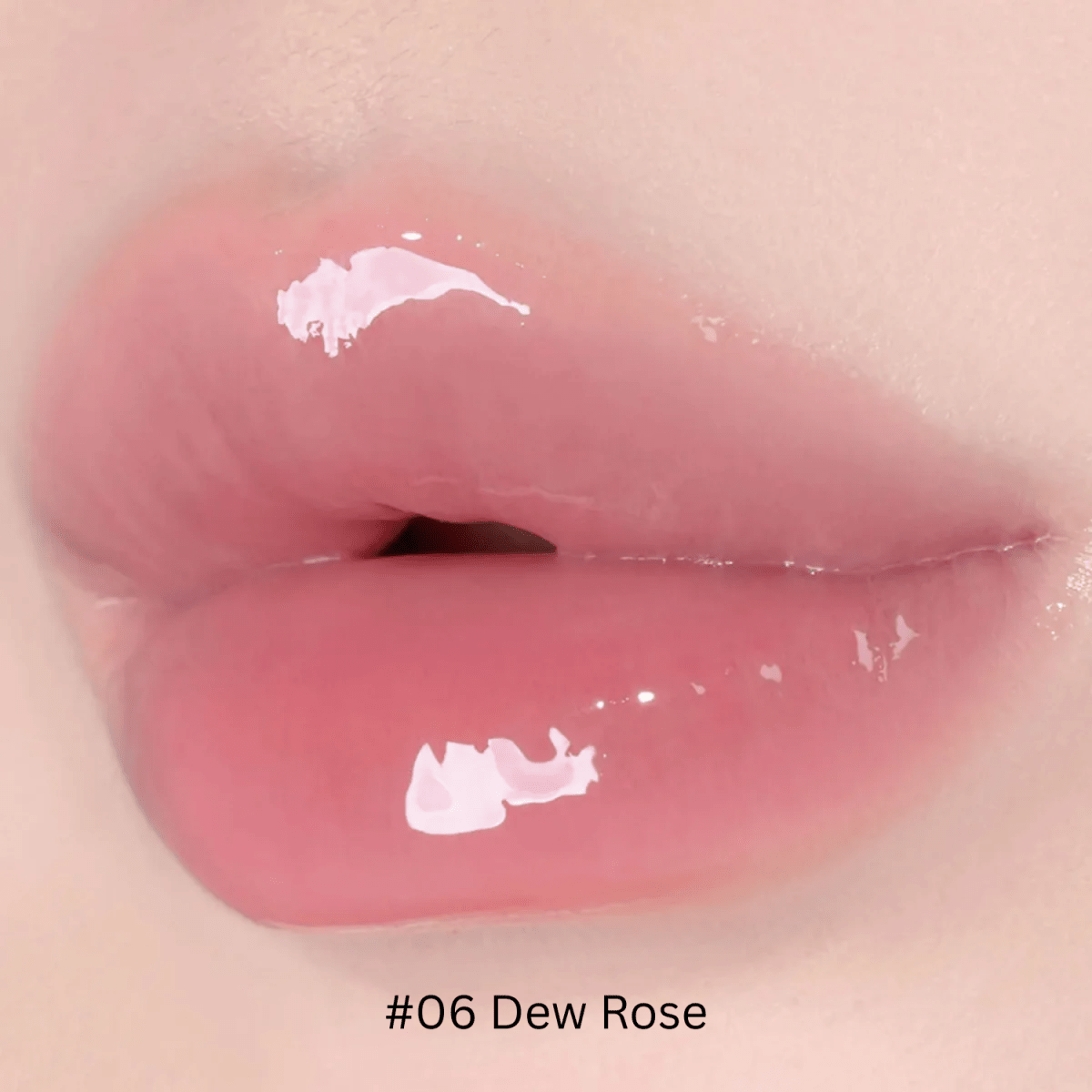 Hince Mirror Dew Gloss lip gloss in a sleek tube, showcasing its shiny, moisturizing formula and reflective packaging.