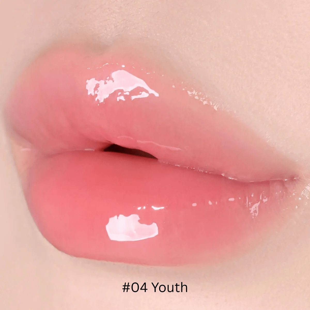 Hince Mirror Dew Gloss lip gloss with shiny, reflective finish and hydrating formula, shown in a sleek tube.
