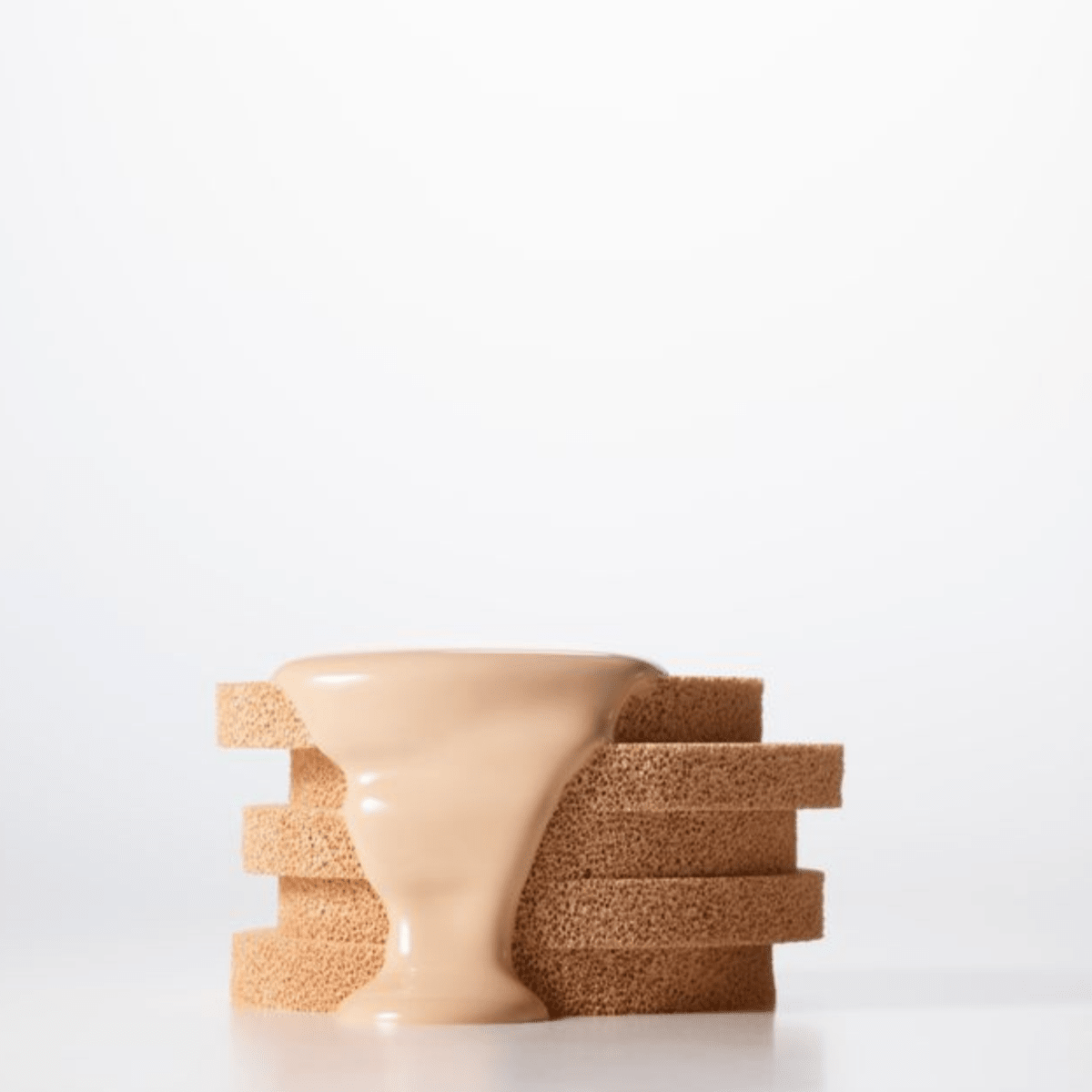 Hince Nu Glow White Cushion foundation in a compact with a mirror, showcasing the product's sleek packaging and applicator.