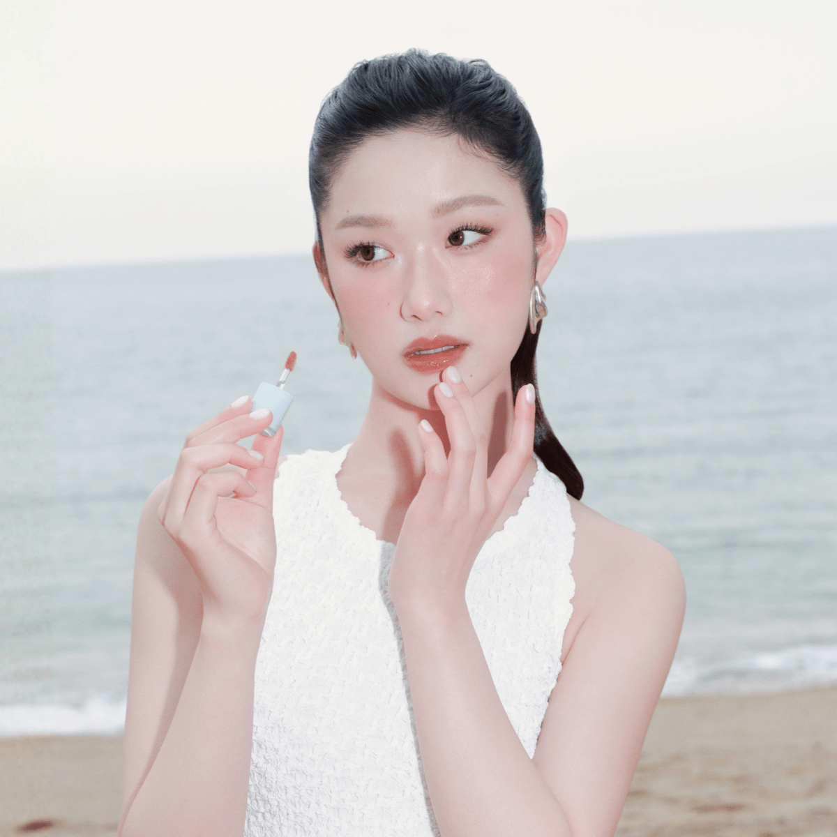 Hince Raw Glow Gel Lip Tint Chill Voyage Edition with a smooth, gel texture in a natural lip color shade