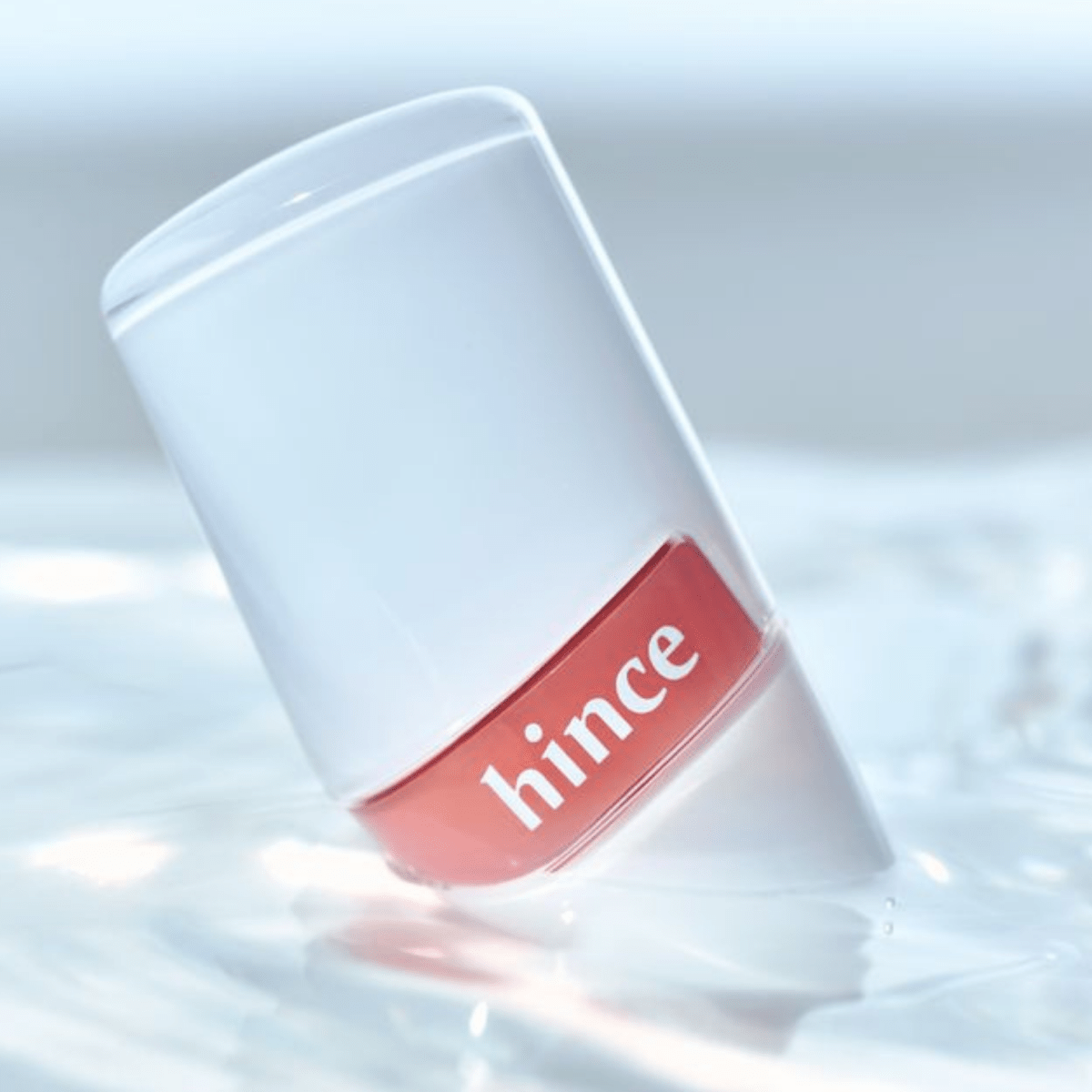 Hince Raw Glow Gel Tint in Chill Voyage Edition applied on lips, showcasing vibrant, glossy lip color and smooth gel texture.