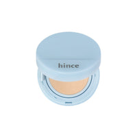 Hince Second Skin Mesh Matte Cushion Foundation from the Chill Voyage Edition, showing the sleek compact and applicator sponge inside.