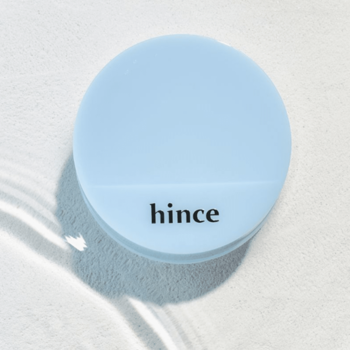 Hince Second Skin Mesh Matte Cushion Foundation from Chill Voyage Edition, showing a close-up of the compact with textured mesh cover.