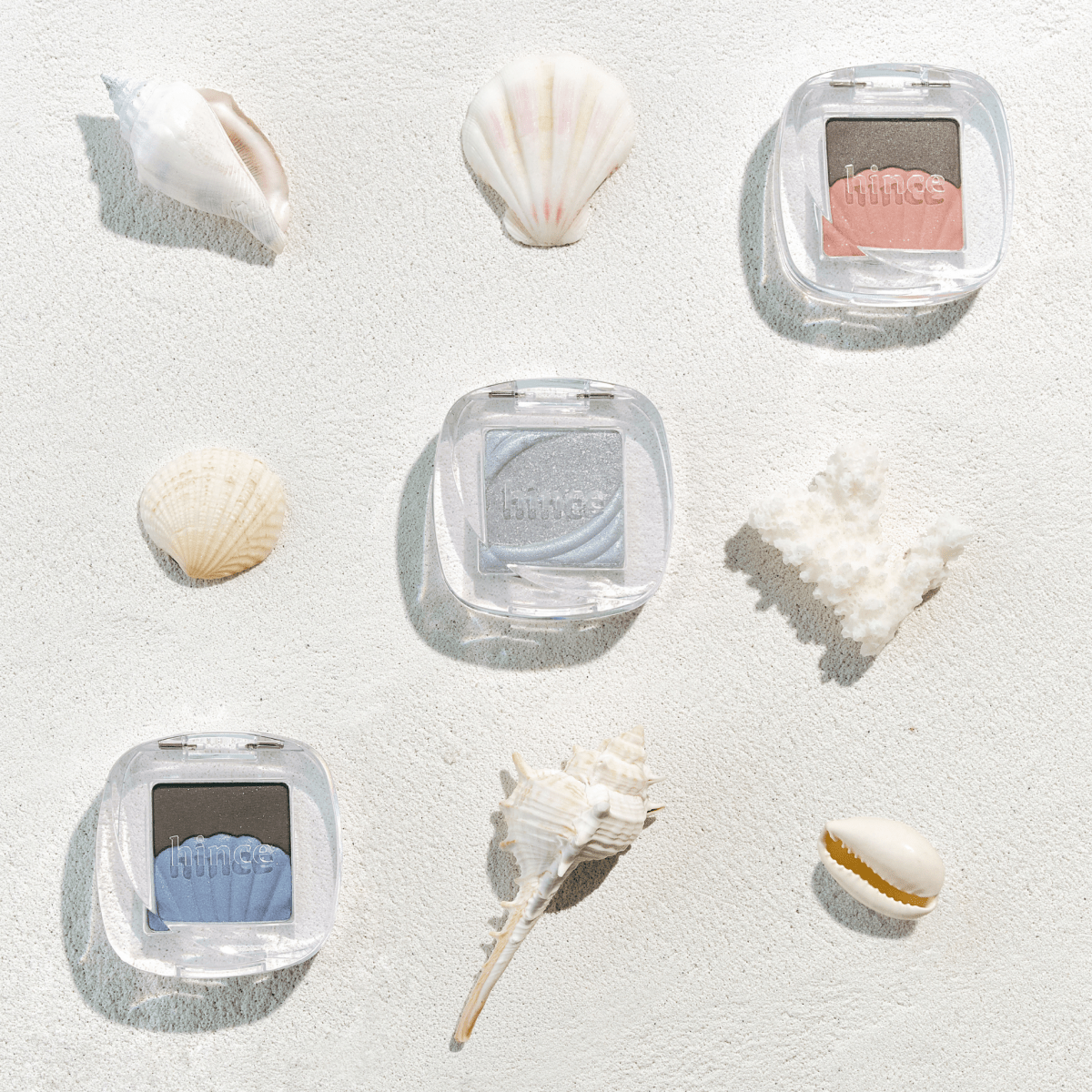 Hince Chill Voyage Edition single eyeshadow in a neutral shade, showcasing its sleek packaging and smooth powder texture.