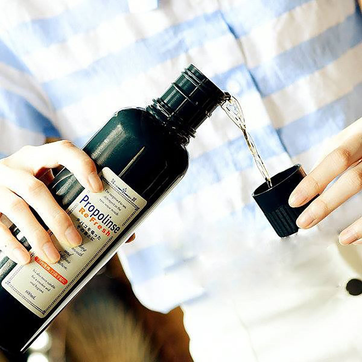 Propolinse Mouthwash Refresh Super Strong Mint 600ml bottle with vibrant mint flavor for fresh breath and oral care.